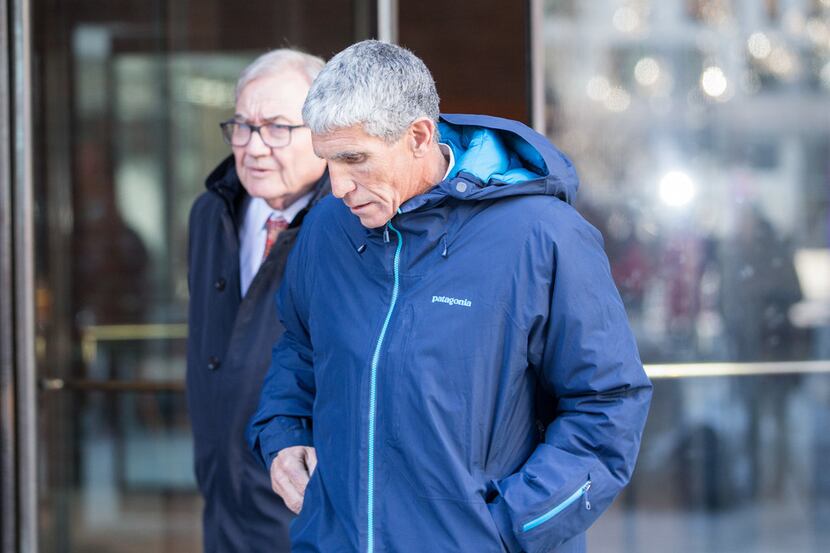 William "Rick" Singer leaves Boston Federal Court after being charged with racketeering...