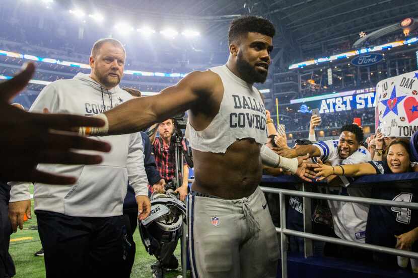 Dallas Cowboys running back Ezekiel Elliott (21) leaves the field after their game against...