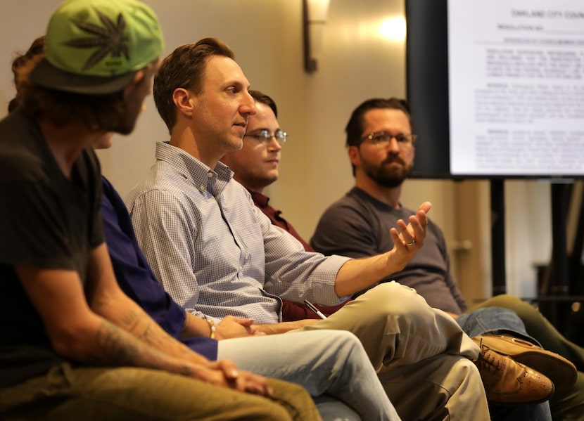 Brandon Friedman speaks during a town hall meeting organized by Decriminalize Nature Dallas...