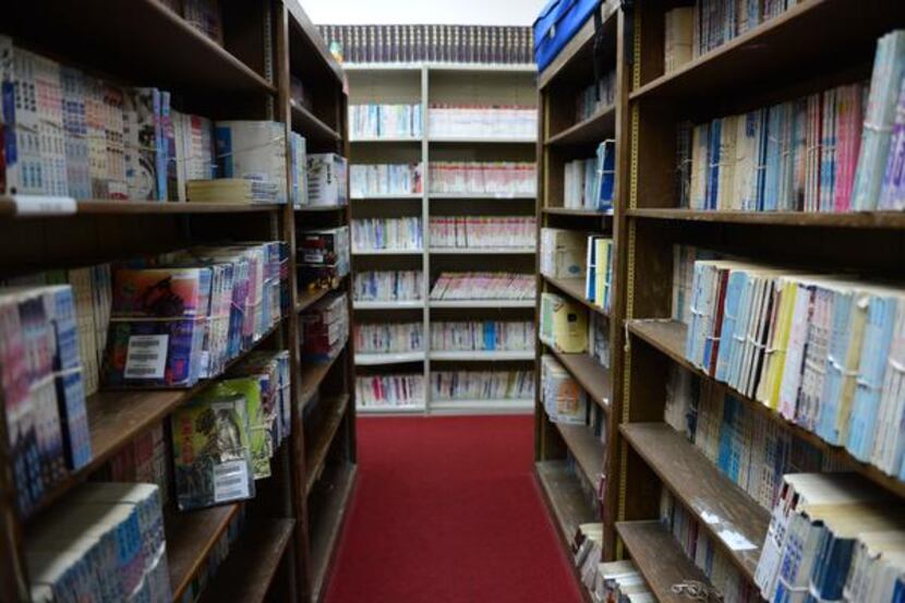 
The library at the Dallas Chinese Community Center in Richardson has about 20,000...
