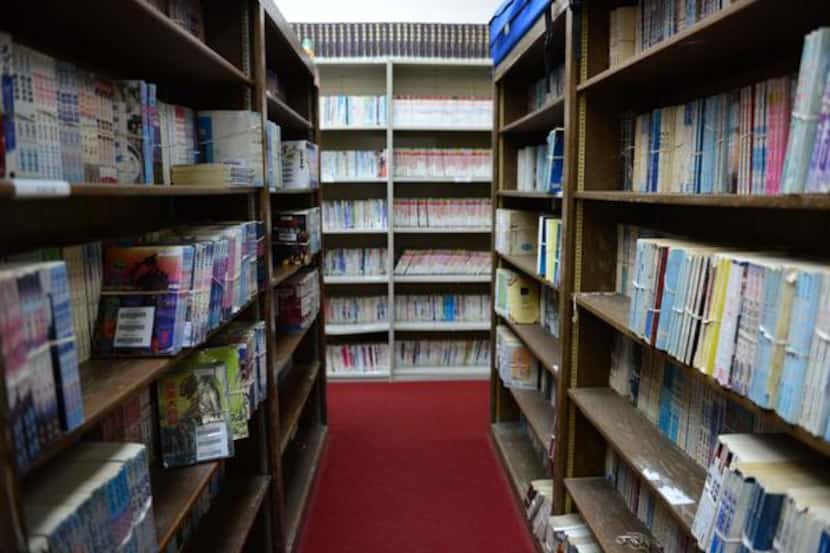 
The library at the Dallas Chinese Community Center in Richardson has about 20,000...