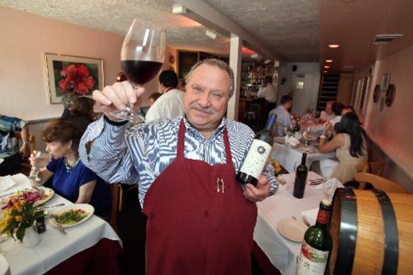 Adelmo Banchetti, who opened Adelmo's Ristorante in September 1989, toasts here in 2009. His...