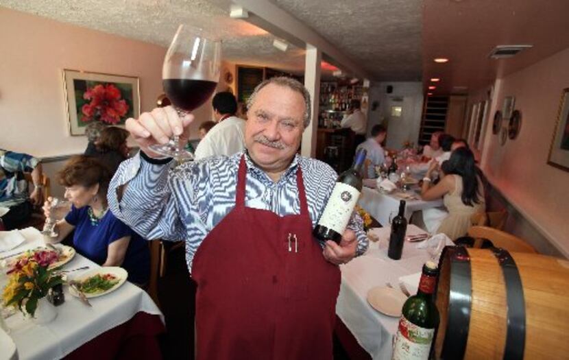 Adelmo Banchetti, who opened Adelmo's Ristorante in September 1989, toasts here in 2009. His...