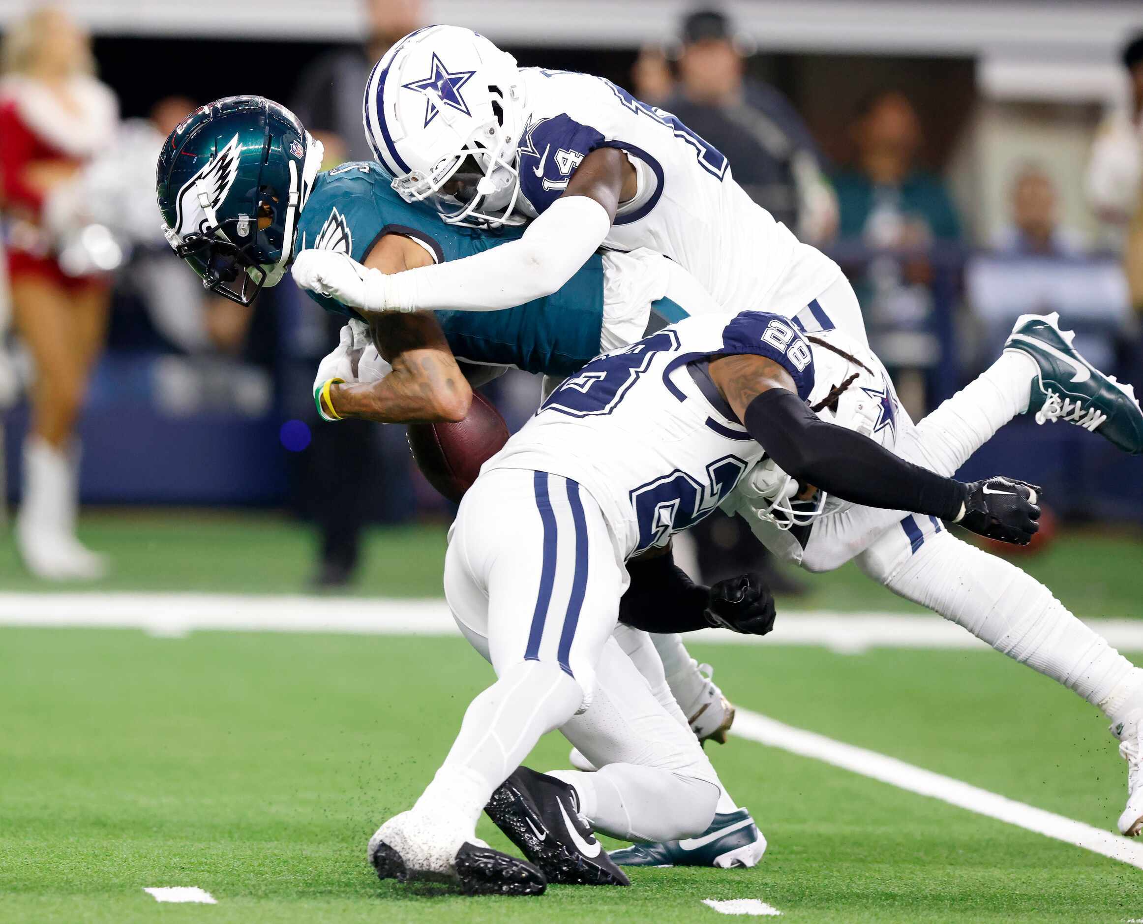 Dallas Cowboys safety Malik Hooker (28) forces Philadelphia Eagles wide receiver DeVonta...