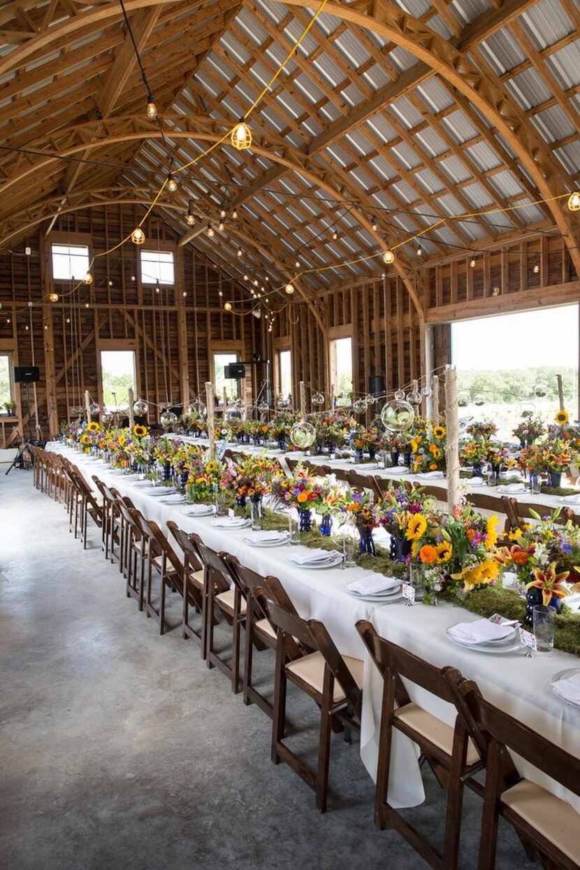 Left:  Tables were set in a classic German-style barn.  Right:  Hosts for the May dinner...