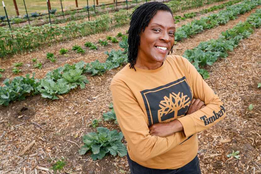 Founder Kim High stands in community garden Joppy Momma's Farm on Tuesday, April 25, 2023....