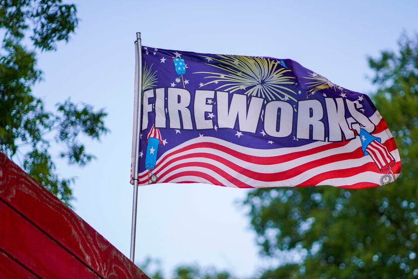 A flag advertises fireworks at NyTex Fireworks on Wednesday, July 1, 2020, in McKinney,...