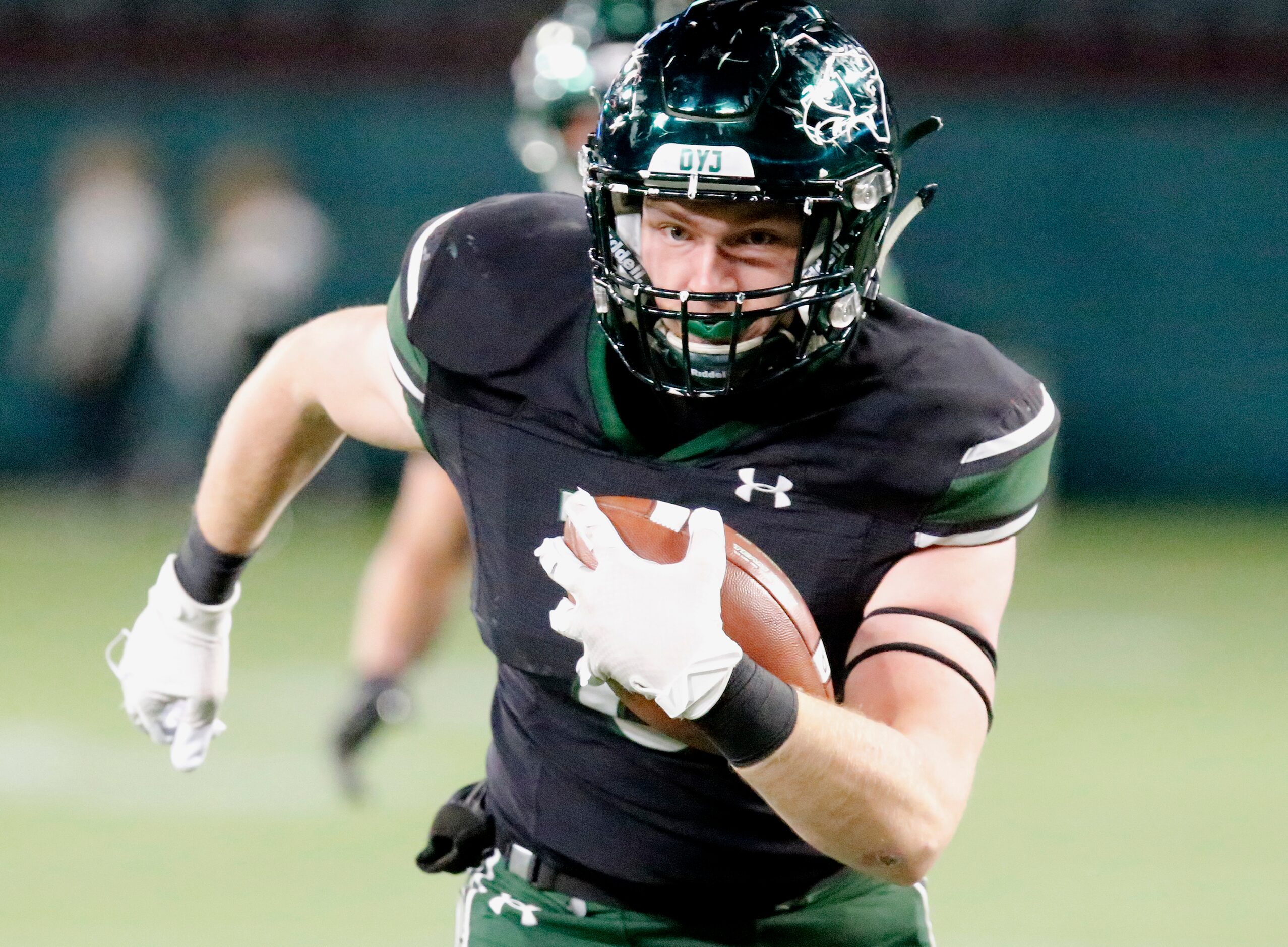 Prosper High School tight end Dylan Hinshaw (8) heads down the sideline after a catch during...