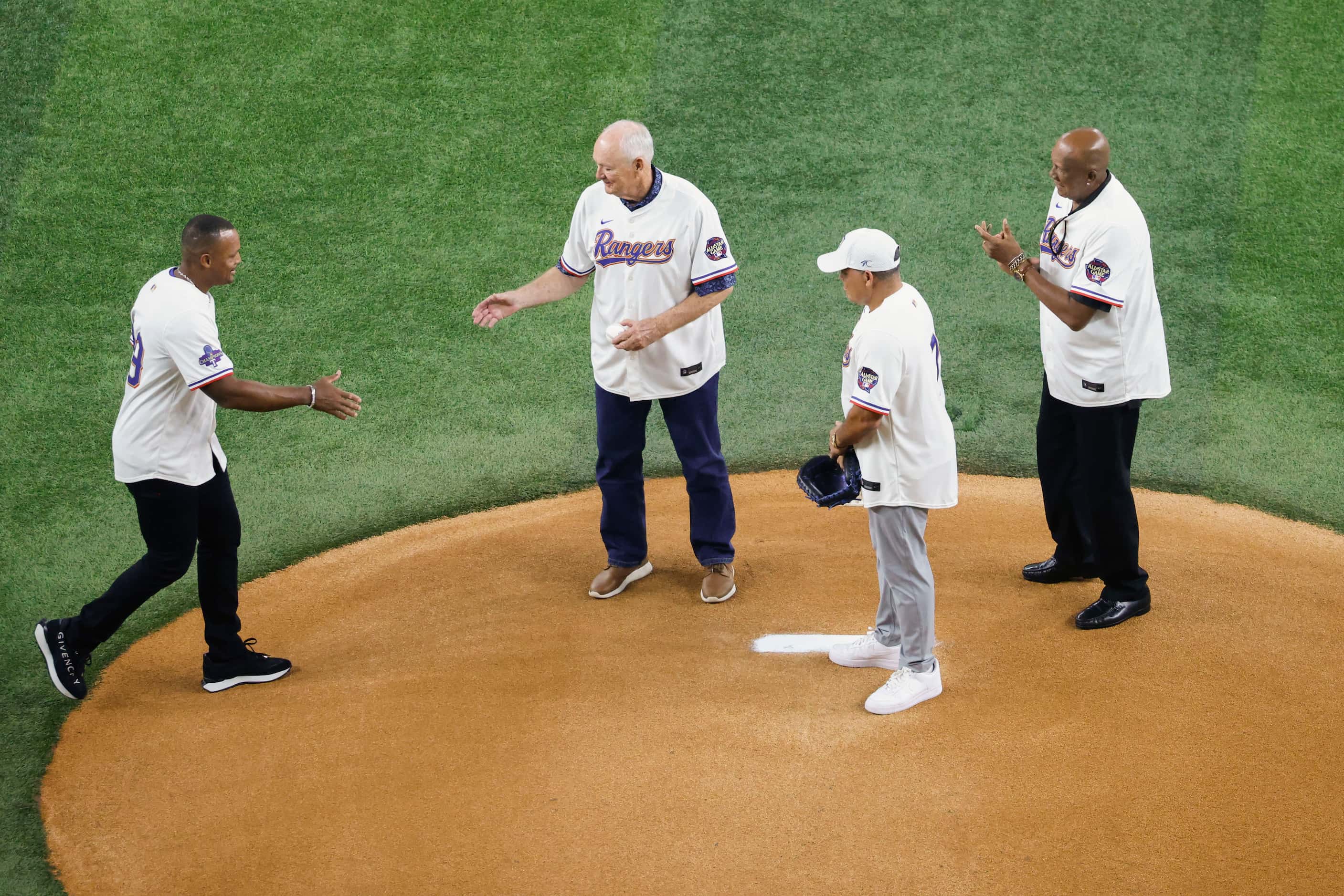 Former Texas Rangers third baseman Adrian Beltre (left) reaches to shake hands with Hall of...