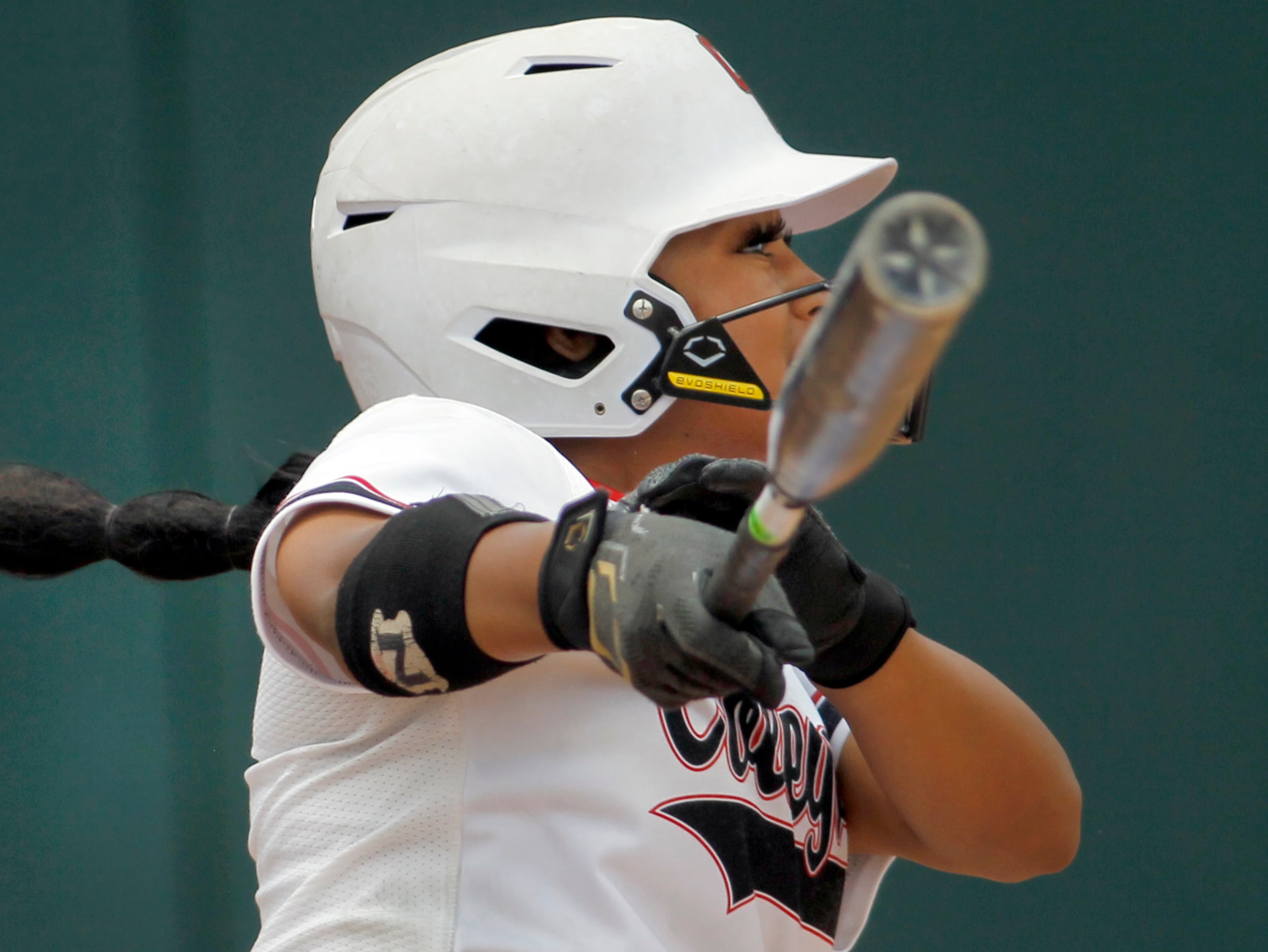 Colleyville Heritage outfielder DeNay Dickson (9) watches the trajectory of a fly ball while...