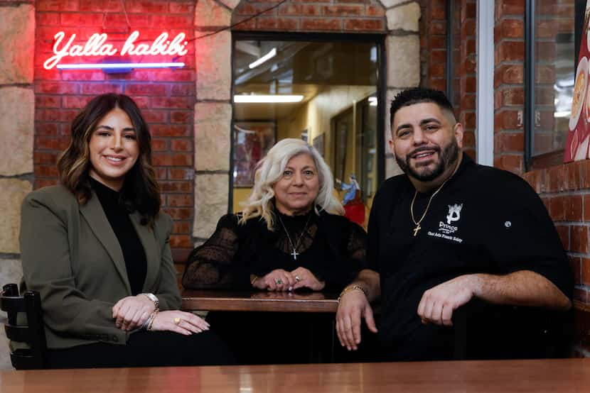 The Kobty family, Elizabeth Kobty (left), her mother Amira (center) and brother Aziz pose...