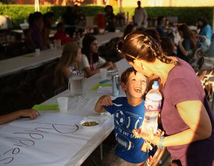 Francyne Jacobs talked to her son Aaron at breakfast Saturday at the Congregation Emanu El...