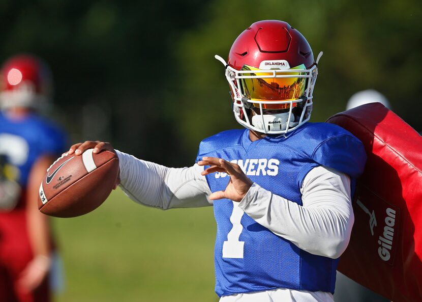 FILE - In this Monday, Aug. 6, 2018, file photo, Oklahoma quarterback Kyler Murray (1)...