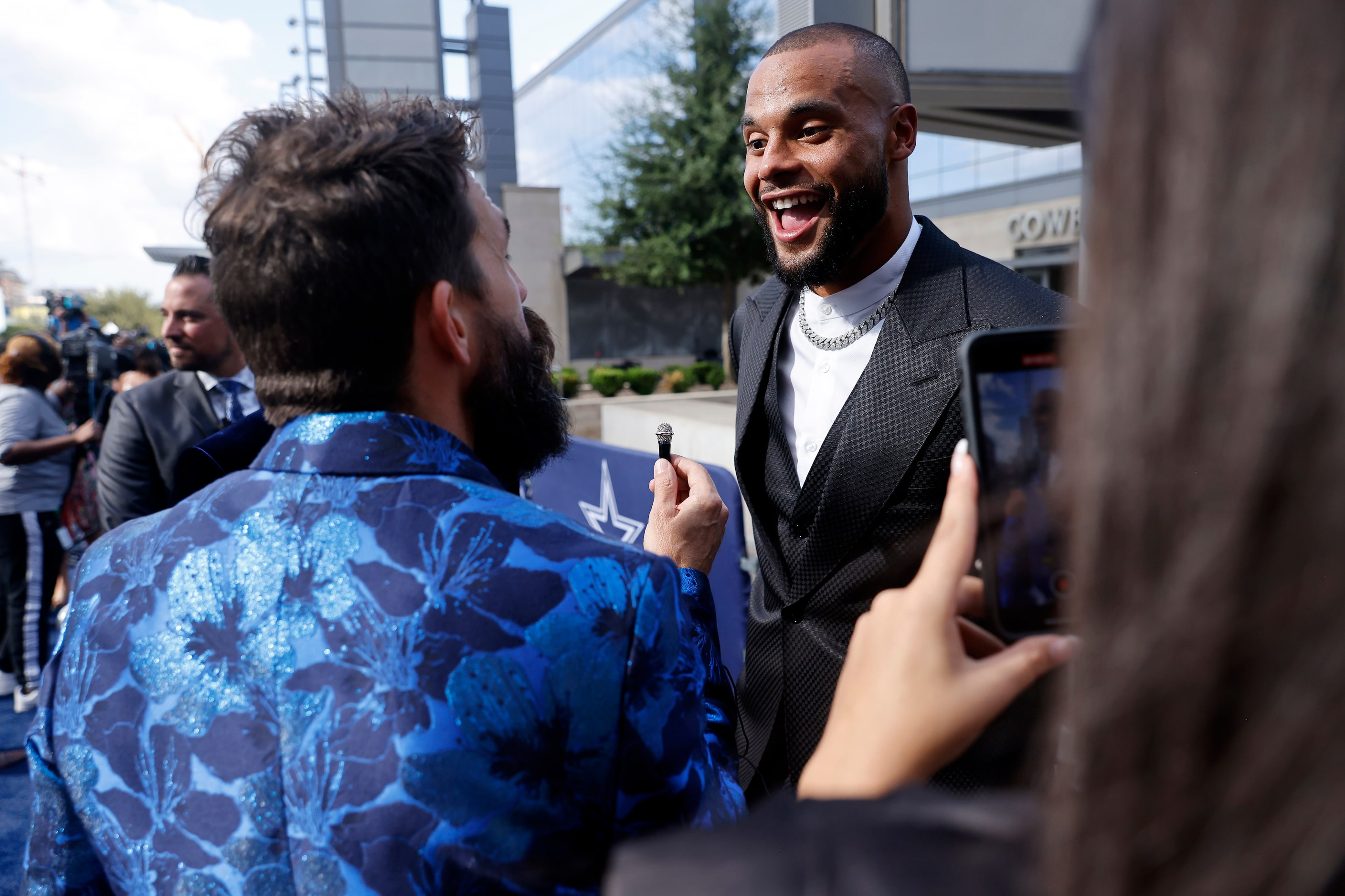 Dallas Cowboys quarterback Dak Prescott is interviewed as he arrives on the blue carpet...