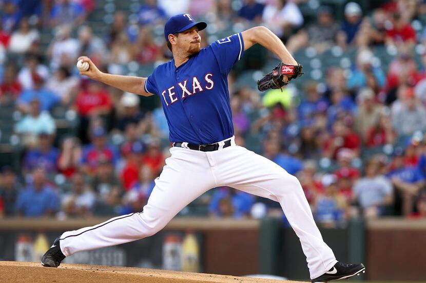 Texas Rangers starting pitcher Nick Tepesch (23) throws in the first frame against the the...