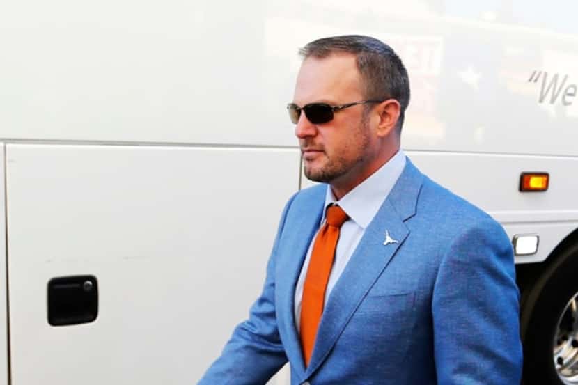 Texas Longhorns head coach Tom Herman makes his way to the stadium before a game against...
