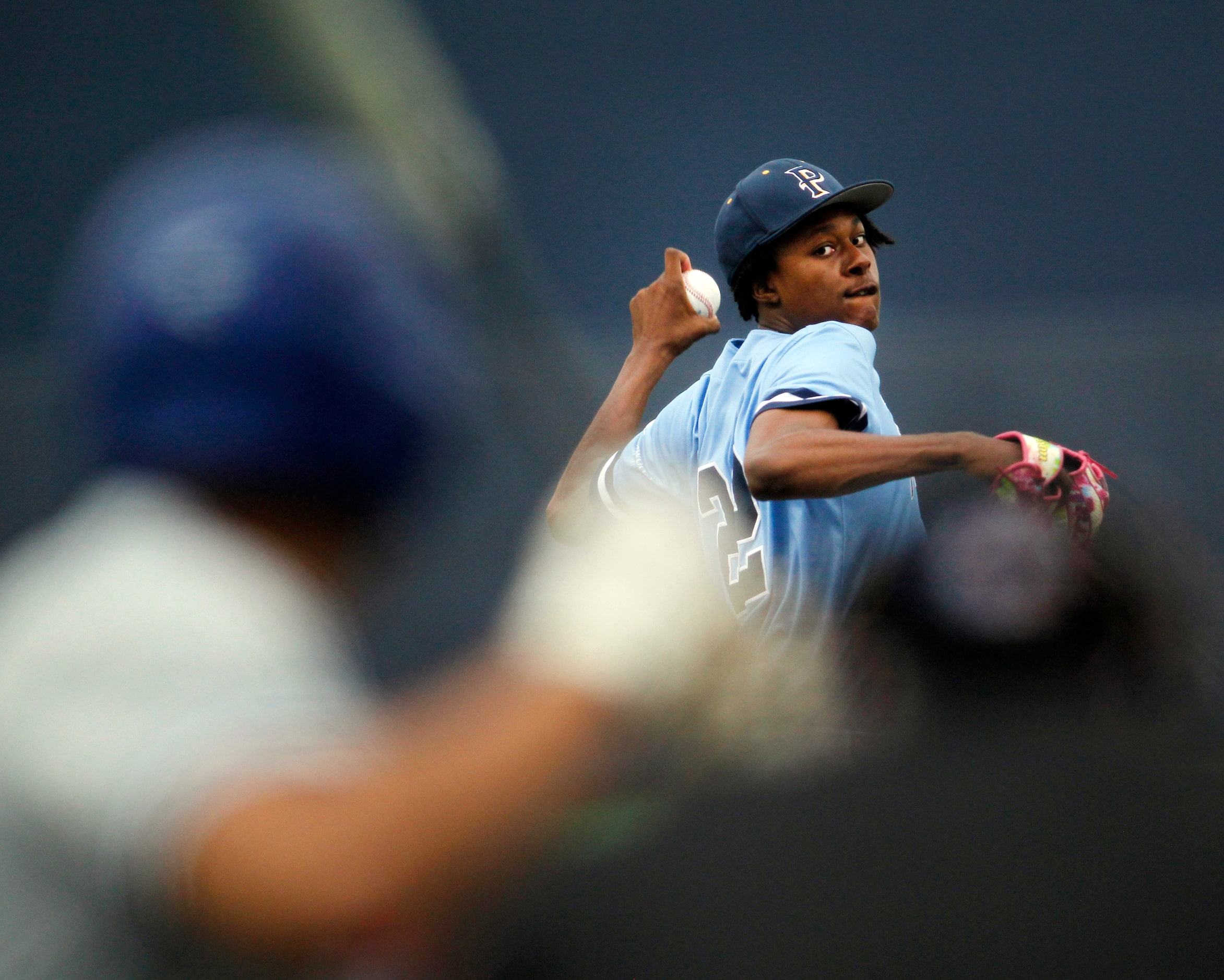  Prestonwood Christian Academy pitcher Xavier Mitchell (22) delivers a pitch to a Parish...