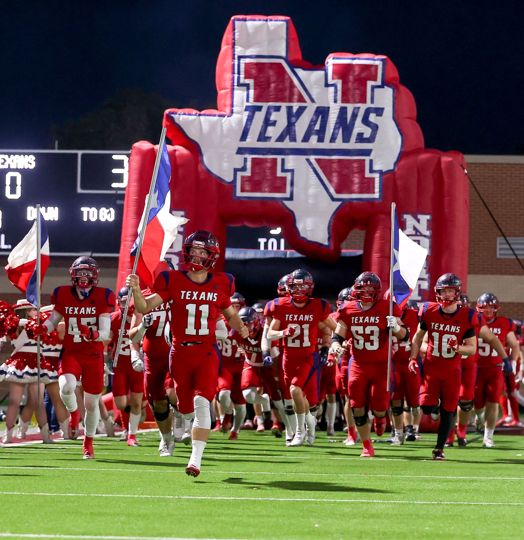 The Justin Northwest Texans enter the field to face Euless Trinity in a District 4-6A high...