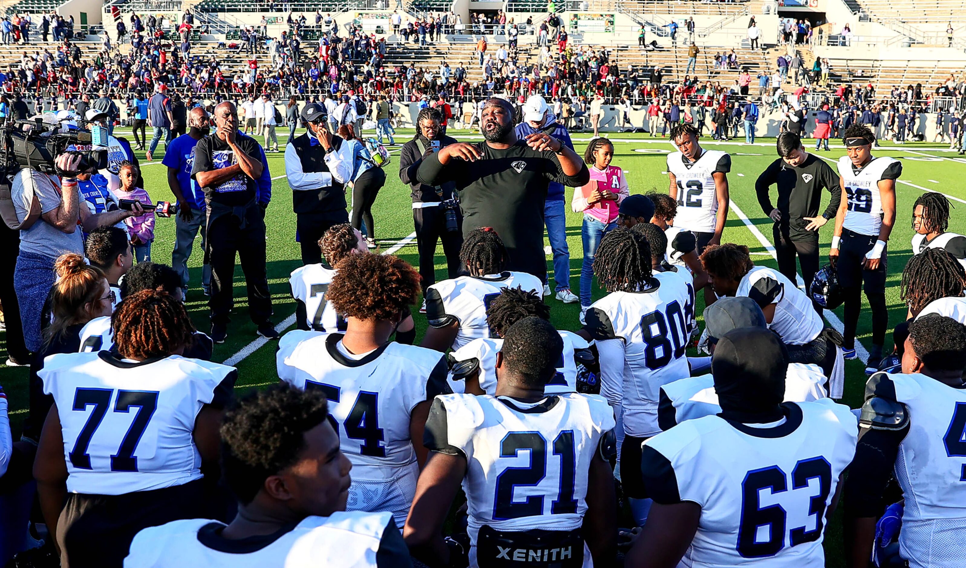 North Crowley head coach Ray Gates talks to his team after beating Allen, 49-37 in the 6A...