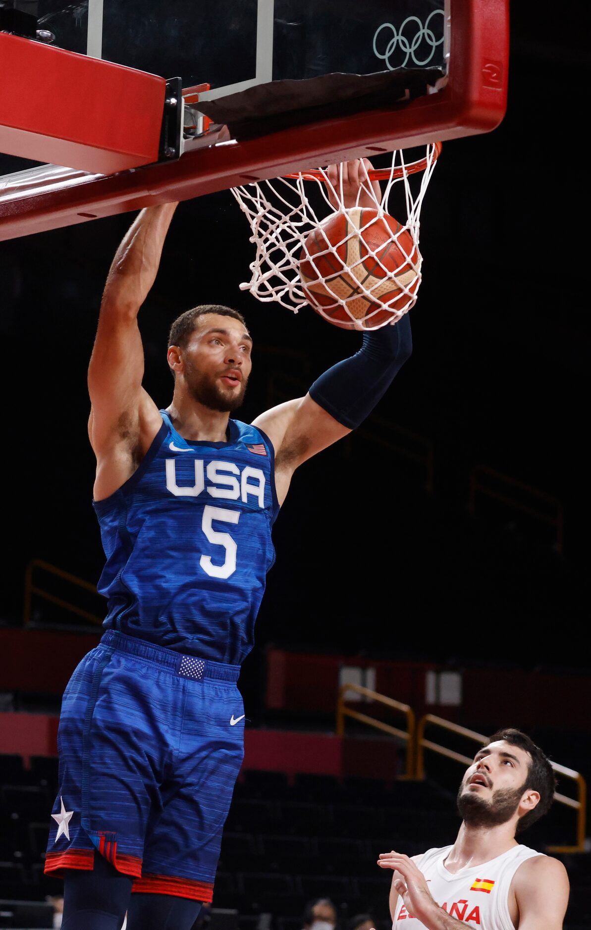 USA’s Zach Lavine (5) dunks the ball in a game against Spain during the first half of a...