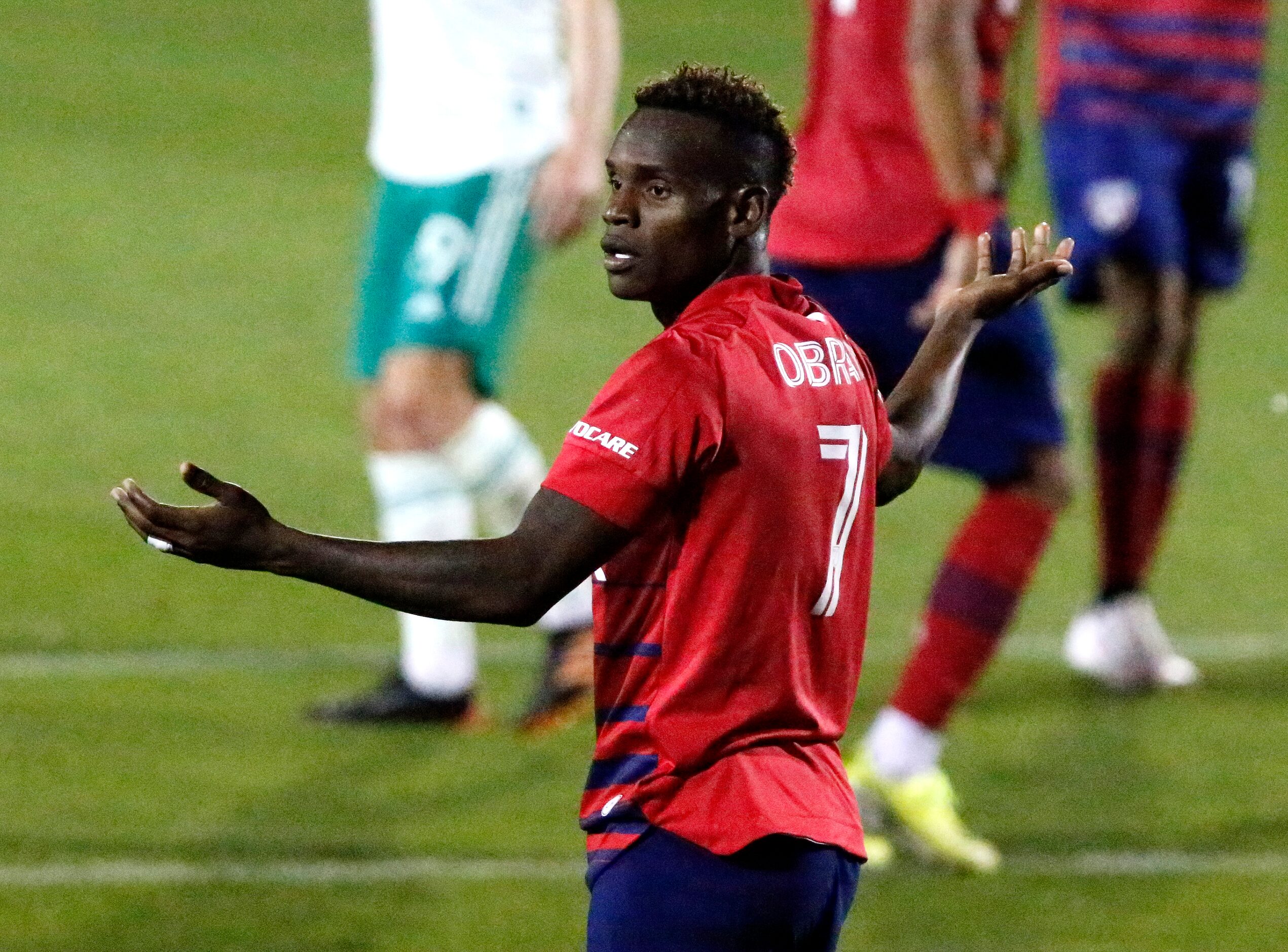 FC Dallas forward Jader Obrian (7) questions a no call during the second half as FC Dallas...