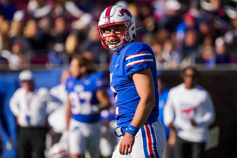 SMU quarterback Preston Stone walks off the field after a series during the second half of...