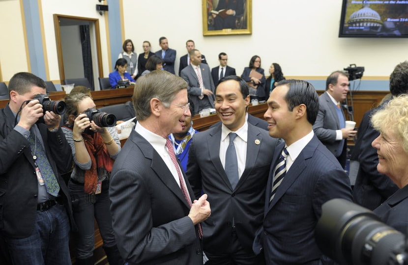 San Antonio Republican Rep. Lamar Smith, seen here talking to the Castro brothers, said it...