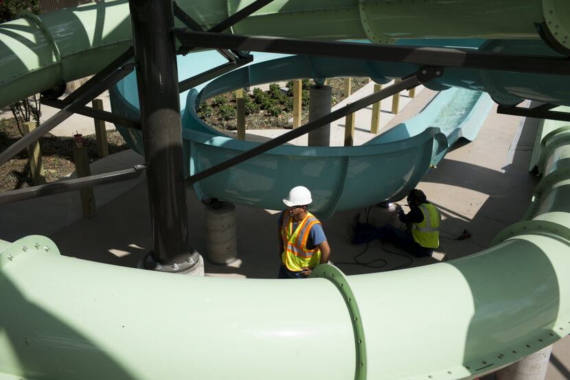 Construction of the JadeWaters resort water park ongoing at the Hilton Anatole on July 13,...