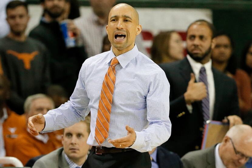 Texas head coach Shaka Smart instructs his team in the second half of an NCAA college...