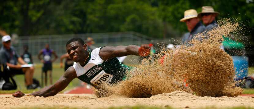 Waxahachie long jumper Jalen Reagor competes in the final round of the 5A Region II meet at...