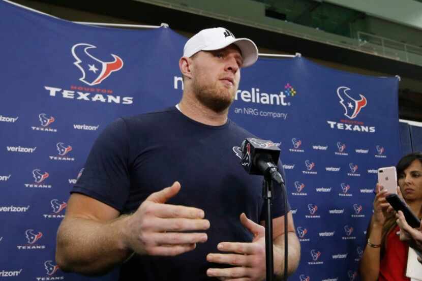 J.J. Watt answers questions during a press conference after practice at The Star in Frisco...