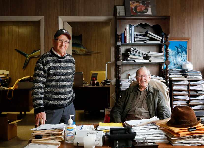 Owners Russ Gilpin (right) and his son Jim Gilpin prepare for the shuttering of the...