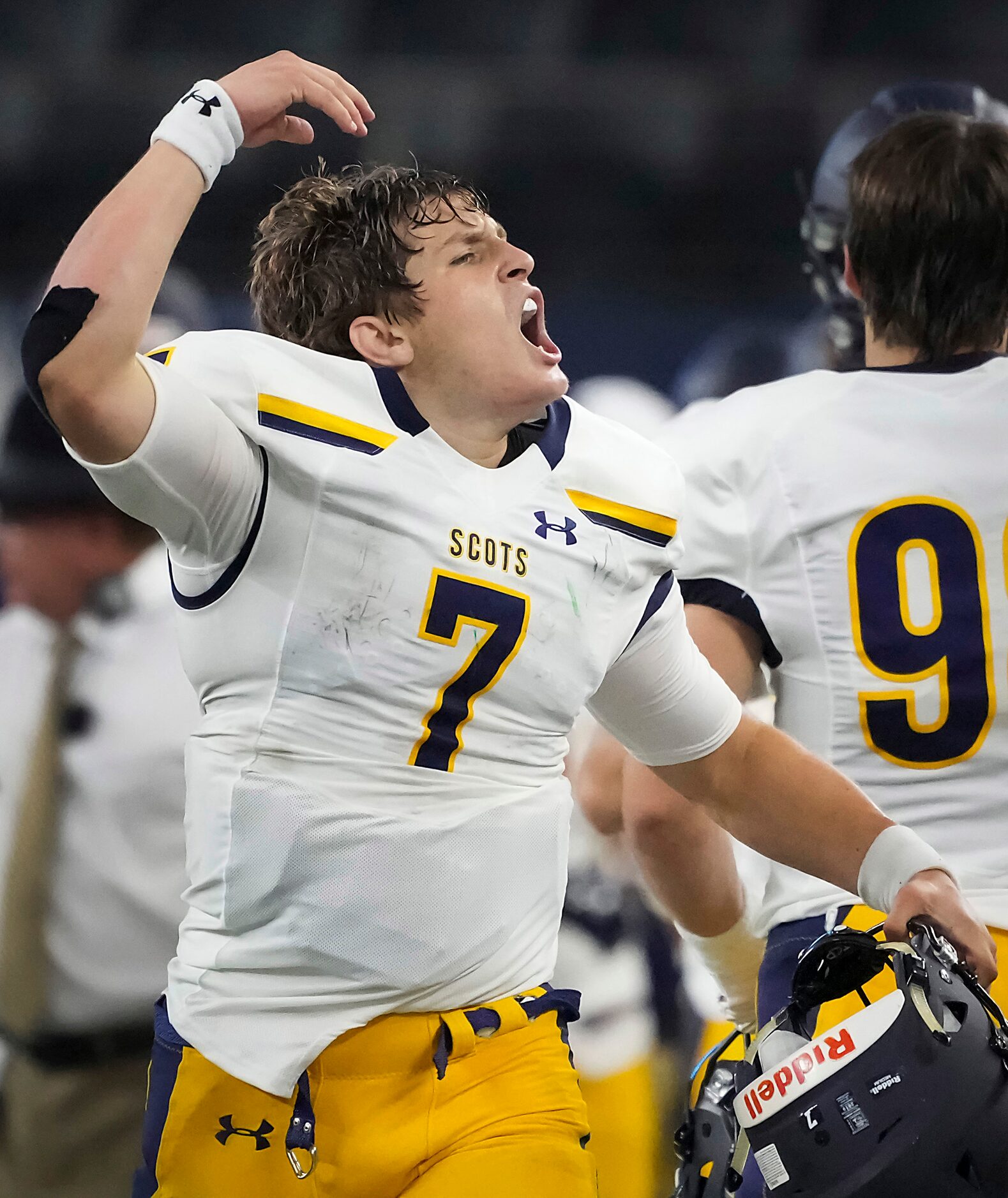 Highland Park quarterback  Brennan Storer (7) celebrates after throwing a touchdown pass...