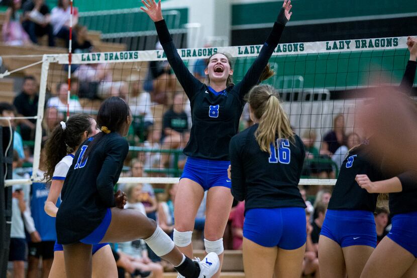 Byron Nelson outside hitter Paige Flickinger (8) celebrates with her teammates during a...