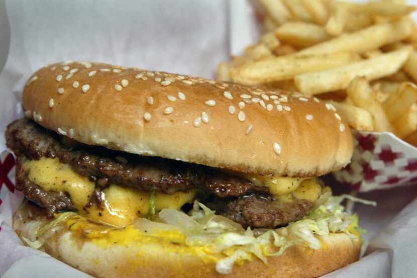 
A cheeseburger with fries at Burger House. The popular Park Cities burger joint now has...