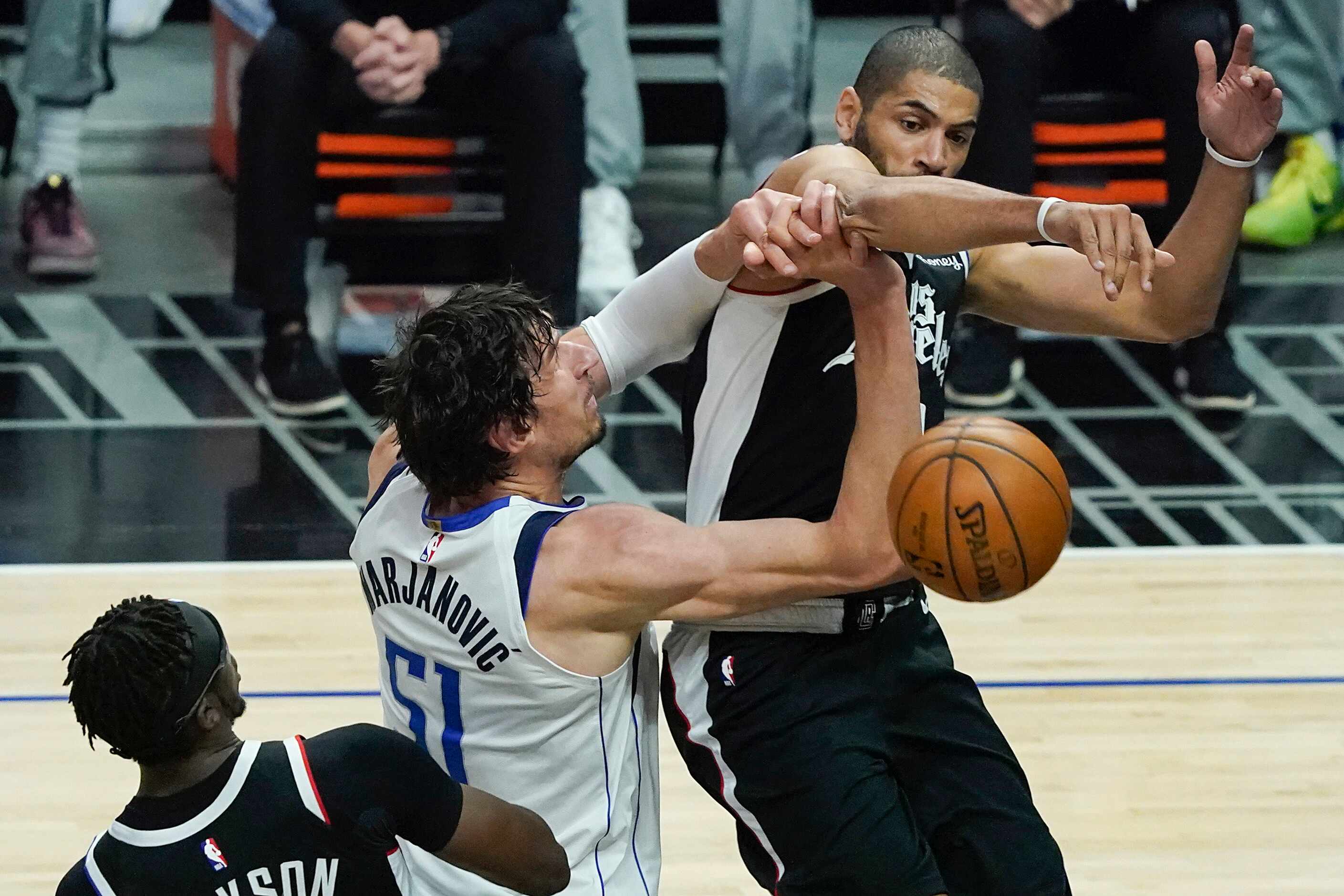 Dallas Mavericks center Boban Marjanovic (51) fights for a rebound against LA Clippers...