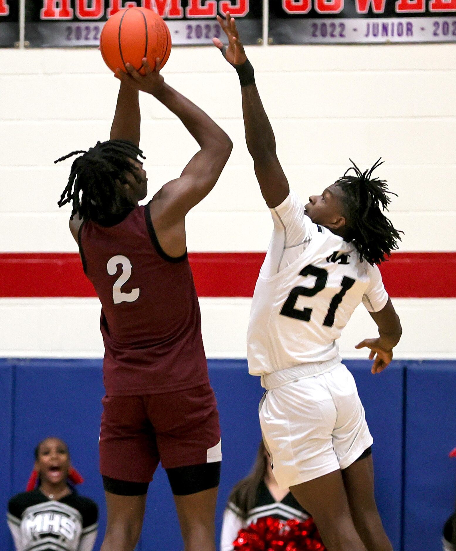 Lewisville forward Jameer Lewis (2) attempts a shot over Arlington Martin guard Josiah...