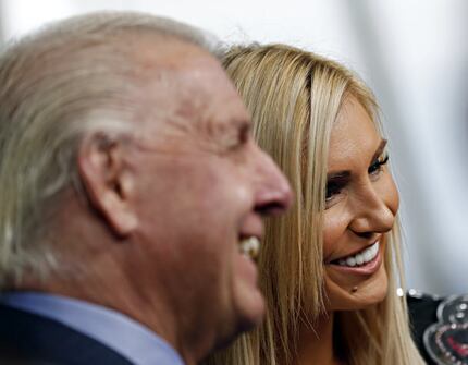 WWE Diva Charlotte (right) and her father,  Ric Flair, talk to media during a press event ...