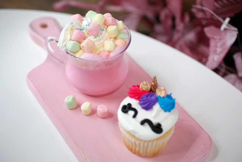 Pink hot chocolate and a unicorn cupcake were two of the menu items at the original Magical...