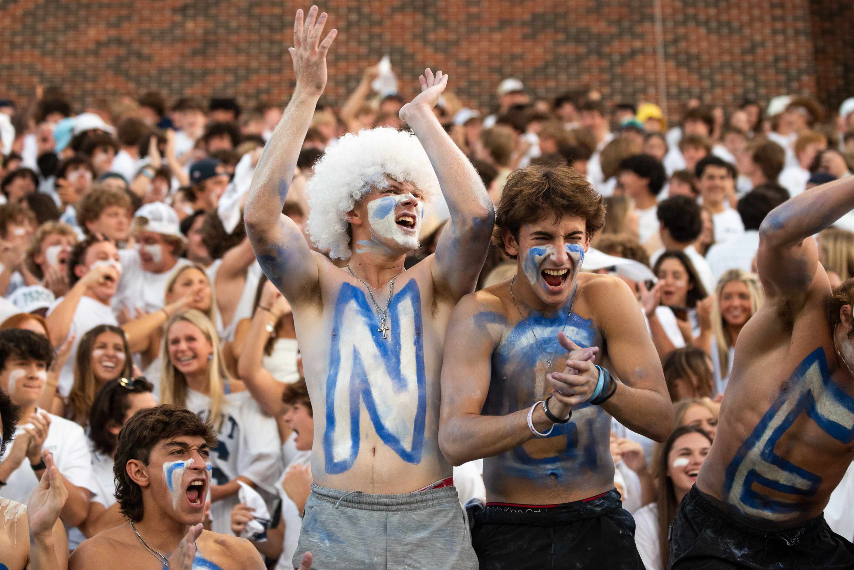 Jesuit fans react during a Friday night high school football game versus Highland Park at...