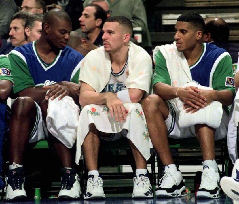 Mashburn, Kidd and Jackson sit on the bench in a game in Dallas on Nov. 12, 1996,.