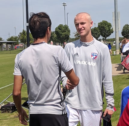 Thomas Roberts (right) sporting the remains of this rookie haircut. (9-15-18)