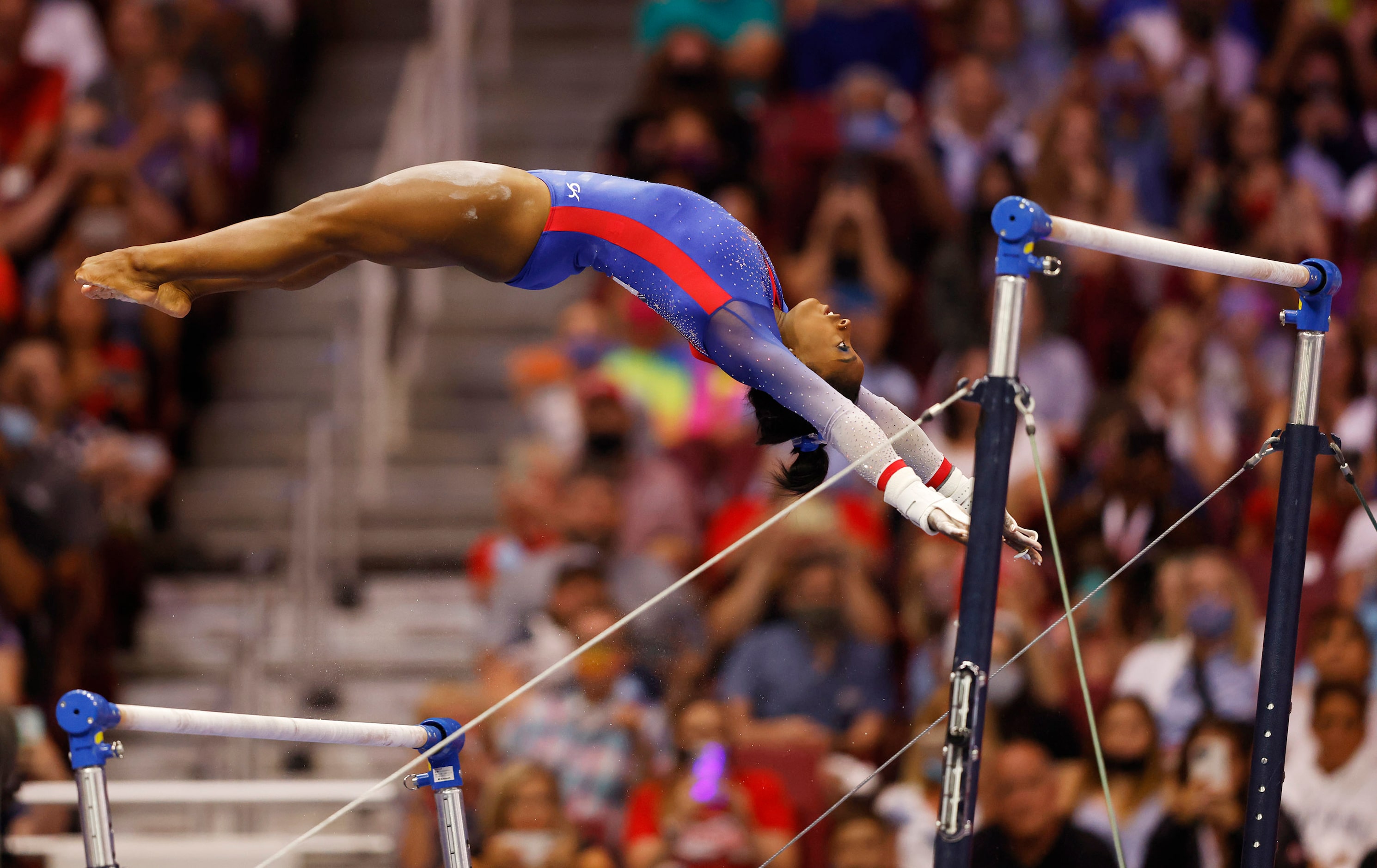 Simone Biles of World Champions competes in the uneven bars during day 1 of the women's 2021...