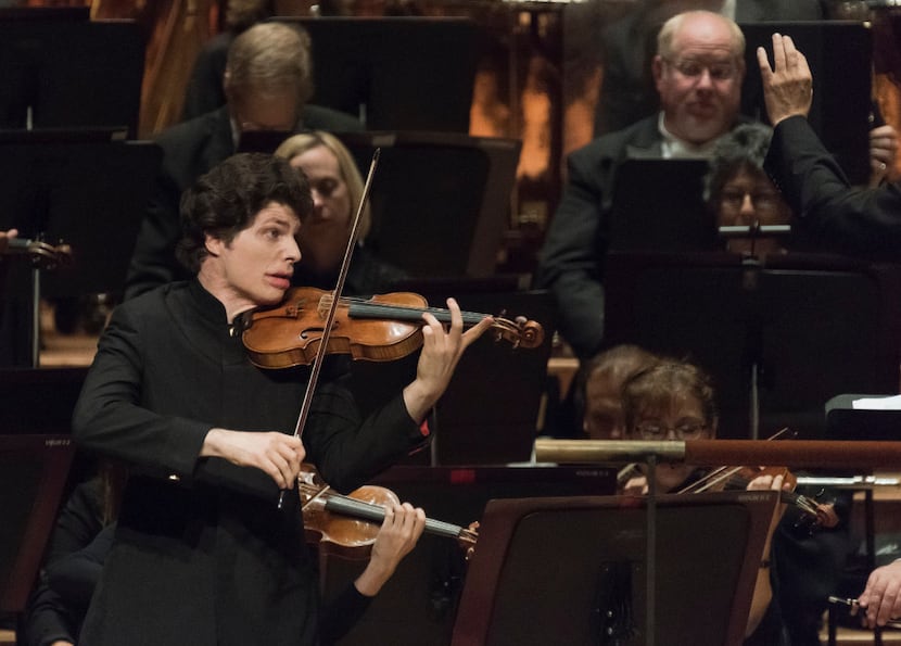 Violinist Augustin Hadelich performs with the Dallas Symphony Orchestra Oct. 13, 2016.

...