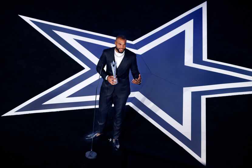 Dallas Cowboys quarterback Dak Prescott speaks after receiving the Beyond the Gridiron Award...