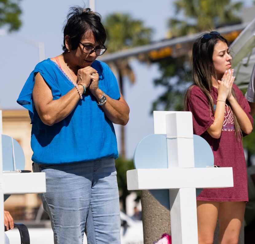 Dora Mendoza (left), grandmother to ten-year-old victim Amerie Jo Garza, takes a moment in...
