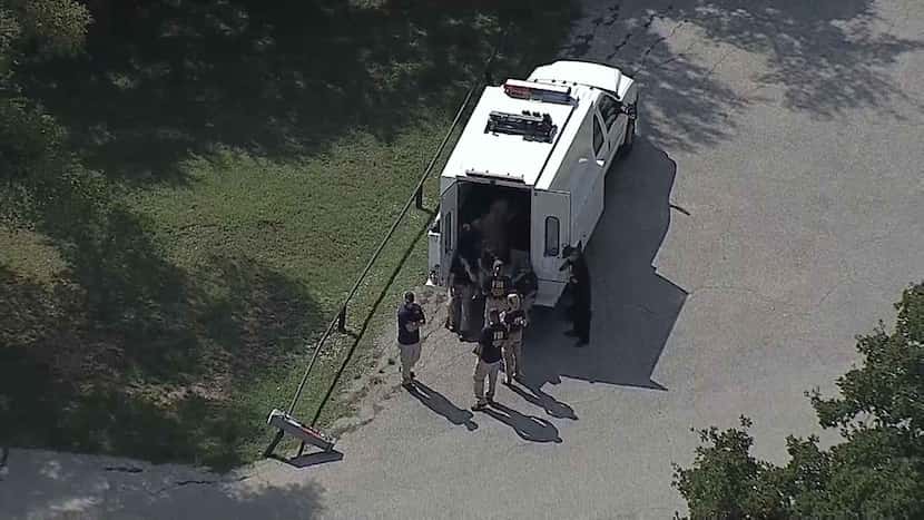 FBI agents were at the scene where a body was found burned and dismembered near Grapevine Lake.