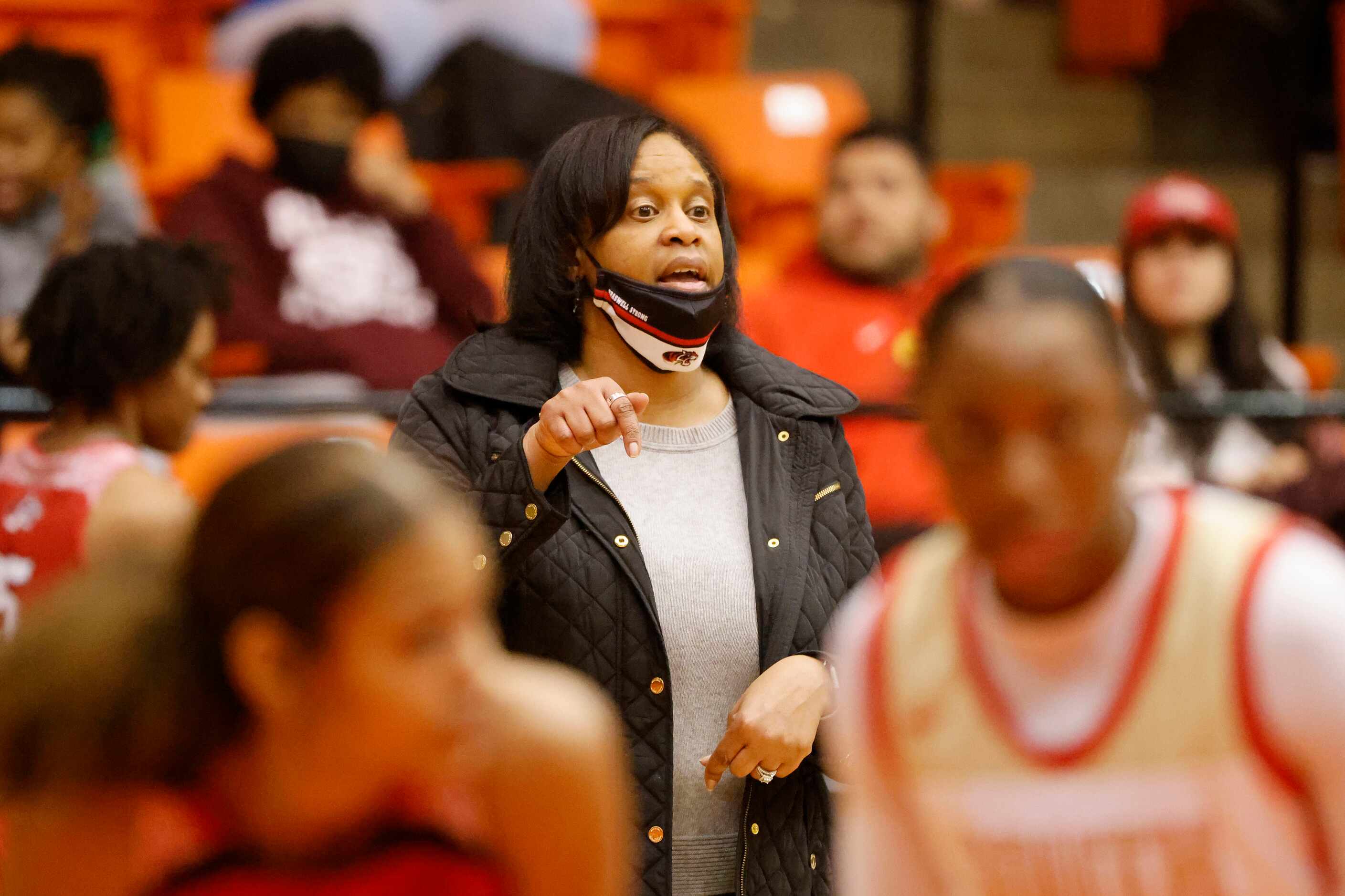Denton Braswell head coach Lisa L. Williams directs her team as they played South Grand...