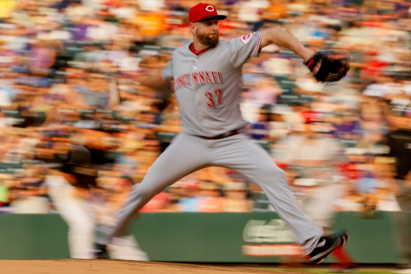 DENVER, CO - JULY 5:  Starting pitcher Scott Feldman #37 of the Cincinnati Reds delivers to...