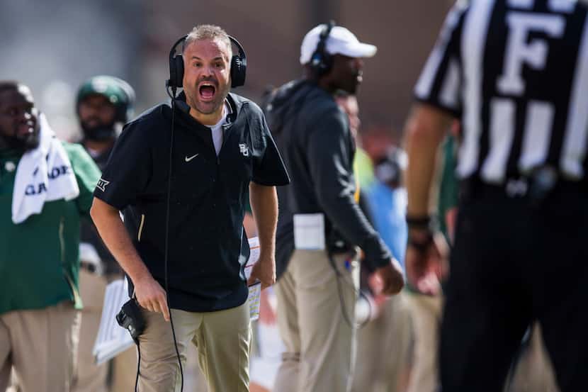 Baylor Bears head coach Matt Rhule yells at a referee during the first quarter of a college...